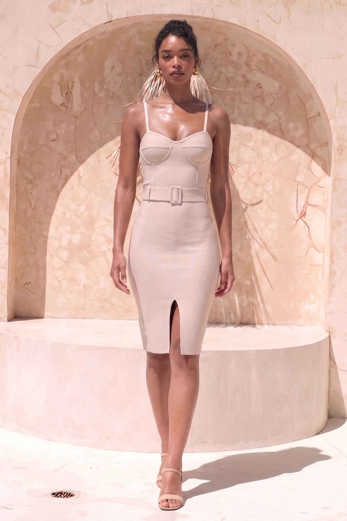 Woman wearing a figure flattering Lana Bandage Dress - Cream BODYCON COLLECTION Pty Ltd