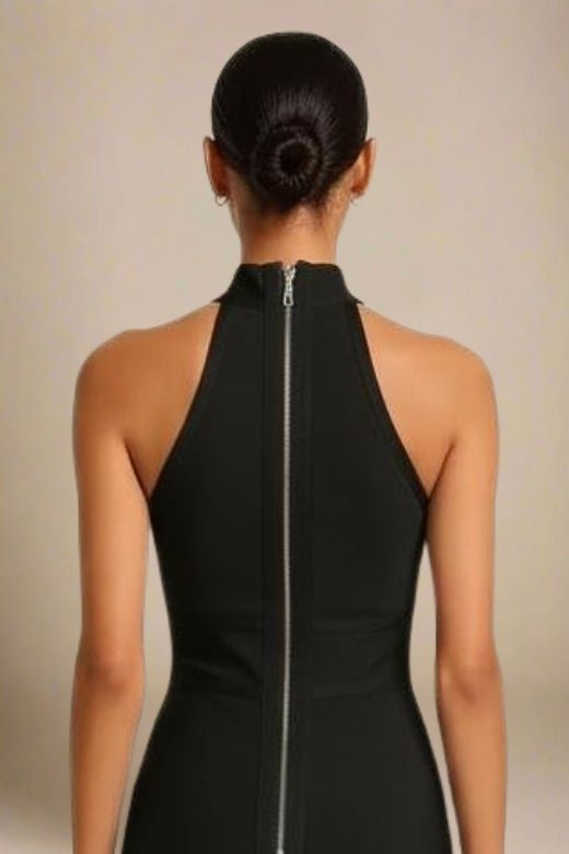 Woman wearing a figure flattering Lea Bandage Midi Dress - Classic Black Bodycon Collection