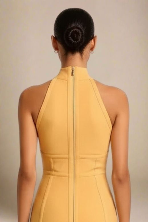 Woman wearing a figure flattering Lea Bandage Midi Dress - Mustard Yellow Bodycon Collection