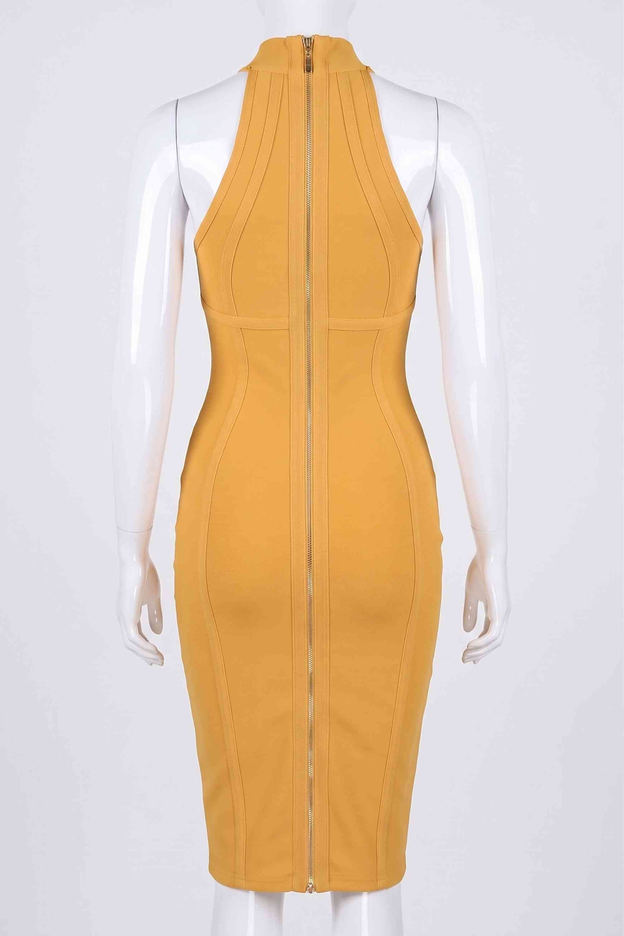 Woman wearing a figure flattering Lea Bandage Midi Dress - Mustard Yellow Bodycon Collection