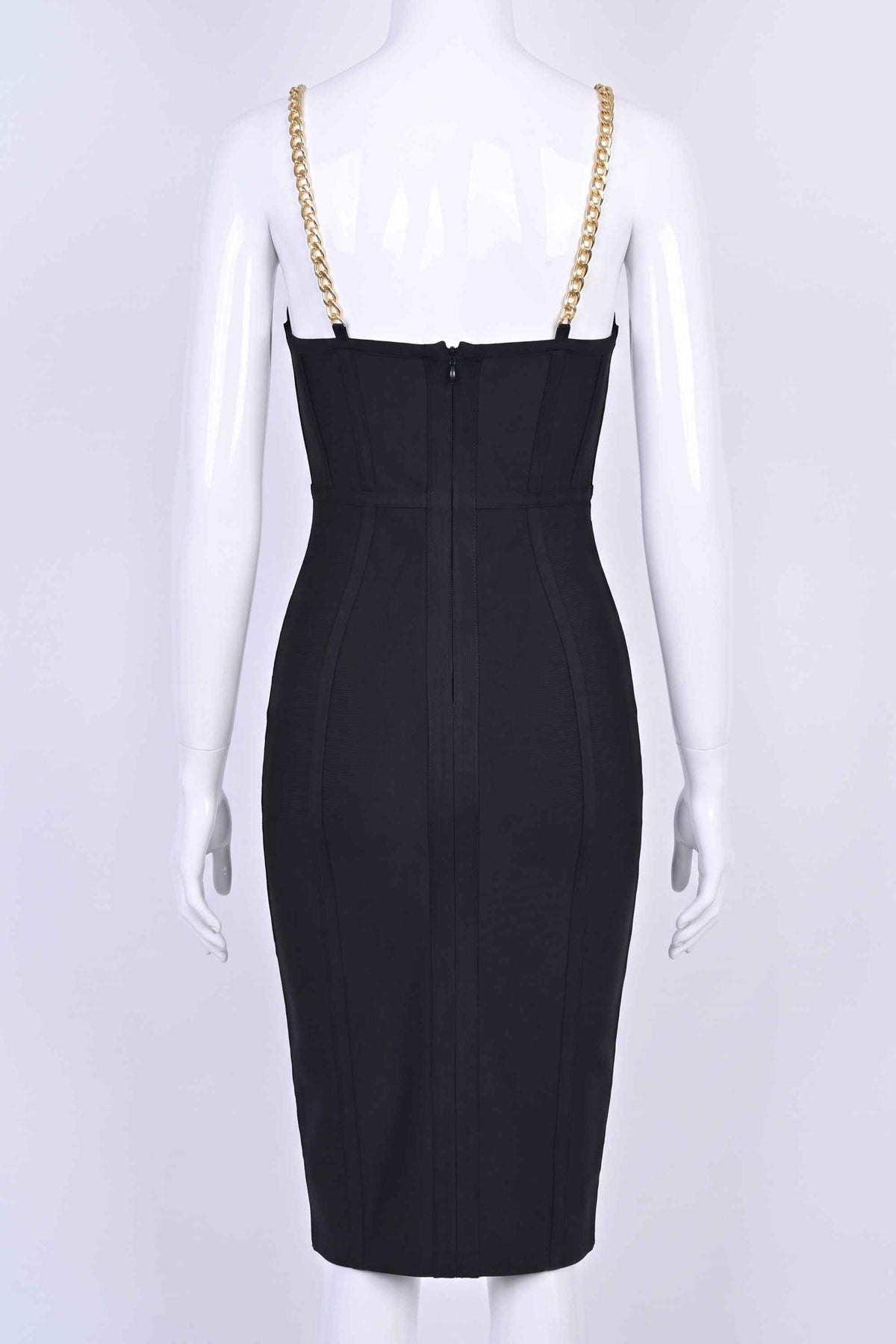 Woman wearing a figure flattering Leah Bodycon Dress - Classic Black Bodycon Collection