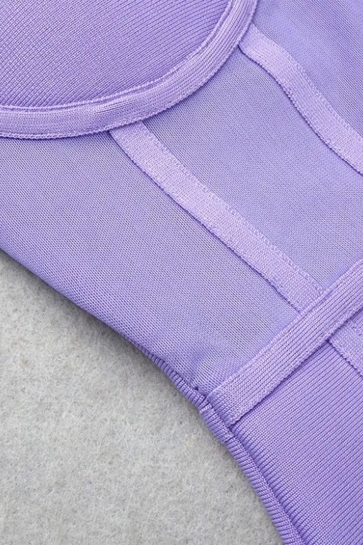 Woman wearing a figure flattering Leah Bodycon Dress - Violet Purple Bodycon Collection