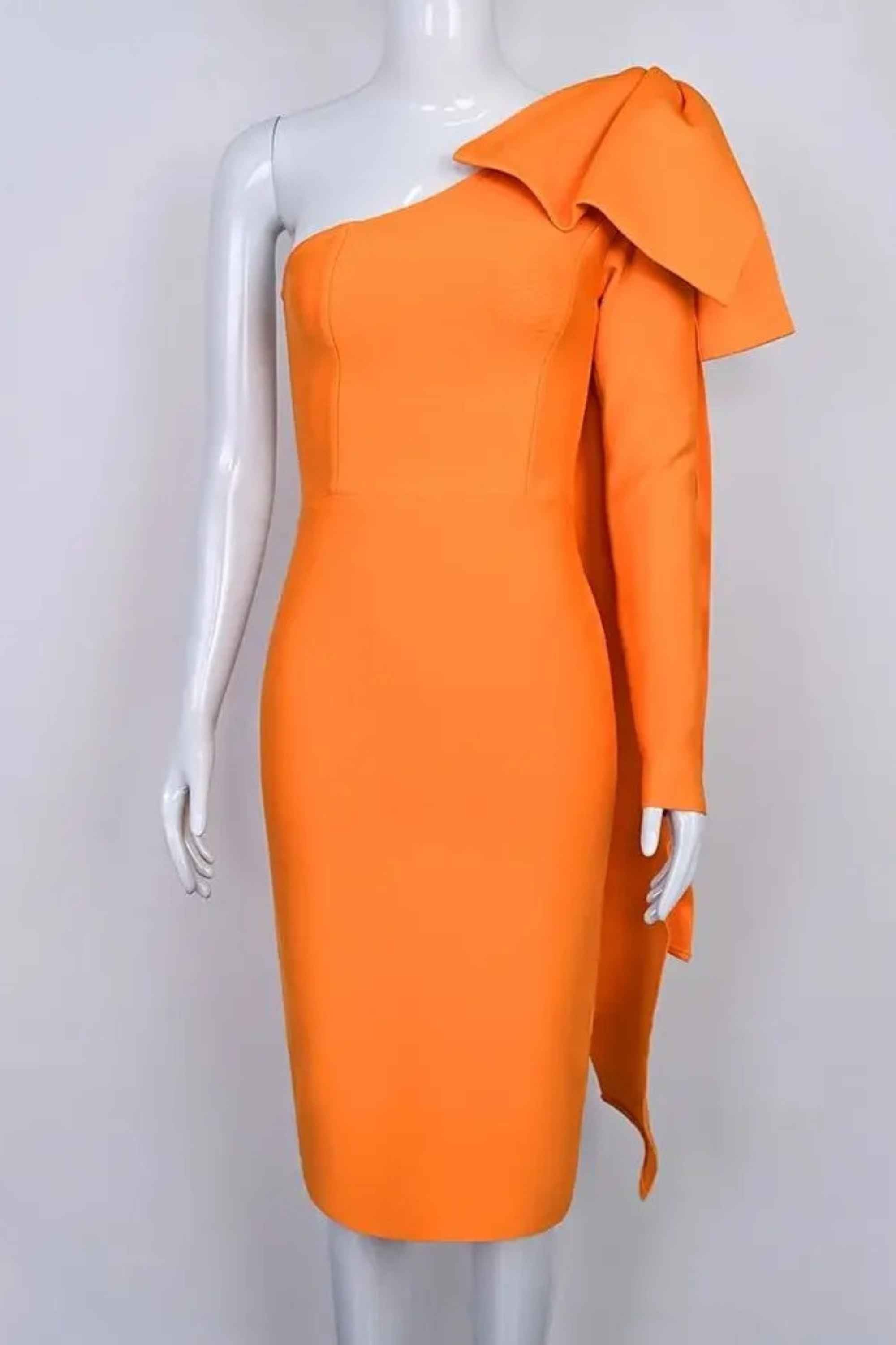 Woman wearing a figure flattering Lela Long Sleeve Bandage Midi Dress - Apricot Orange BODYCON COLLECTION