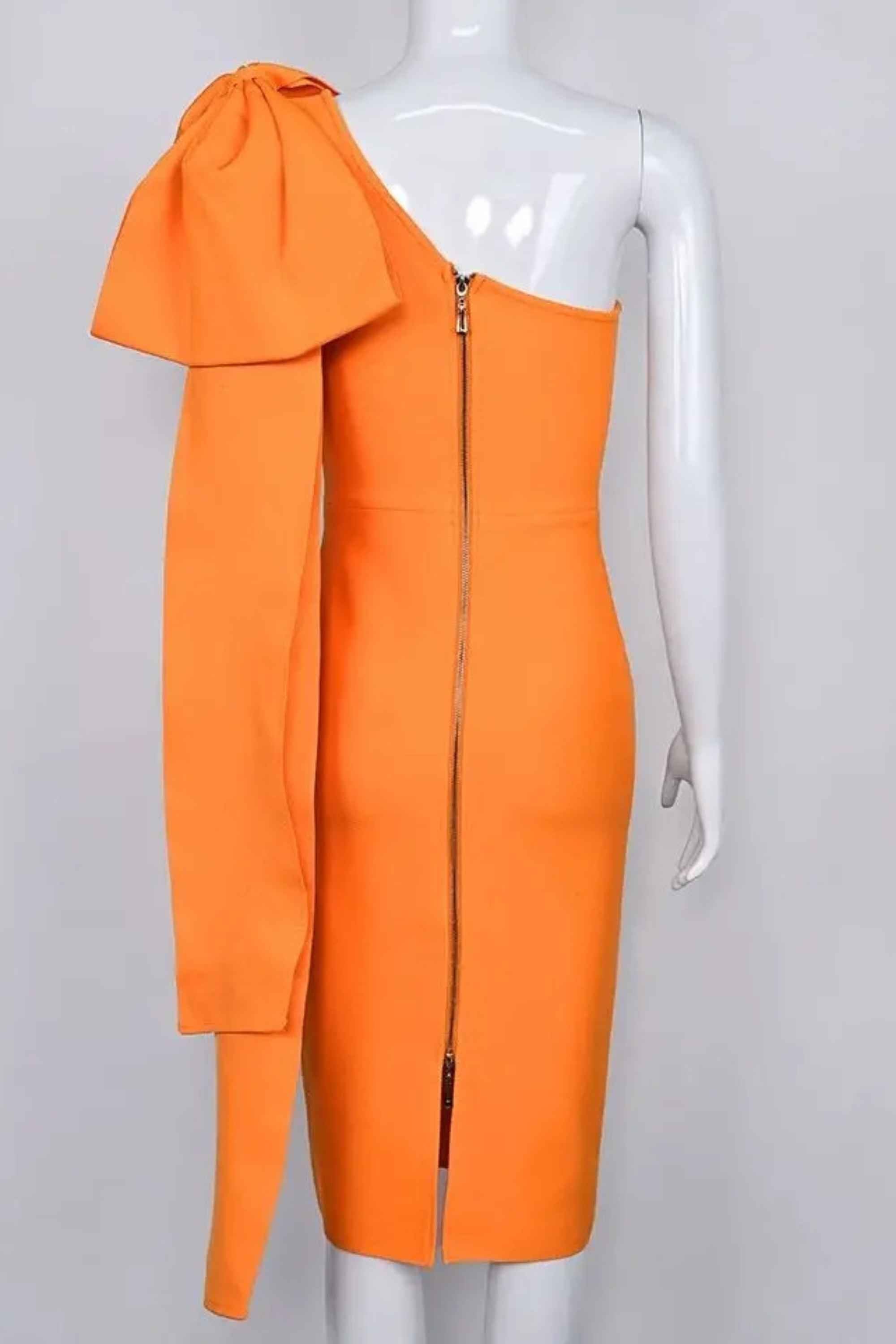 Woman wearing a figure flattering Lela Long Sleeve Bandage Midi Dress - Apricot Orange BODYCON COLLECTION
