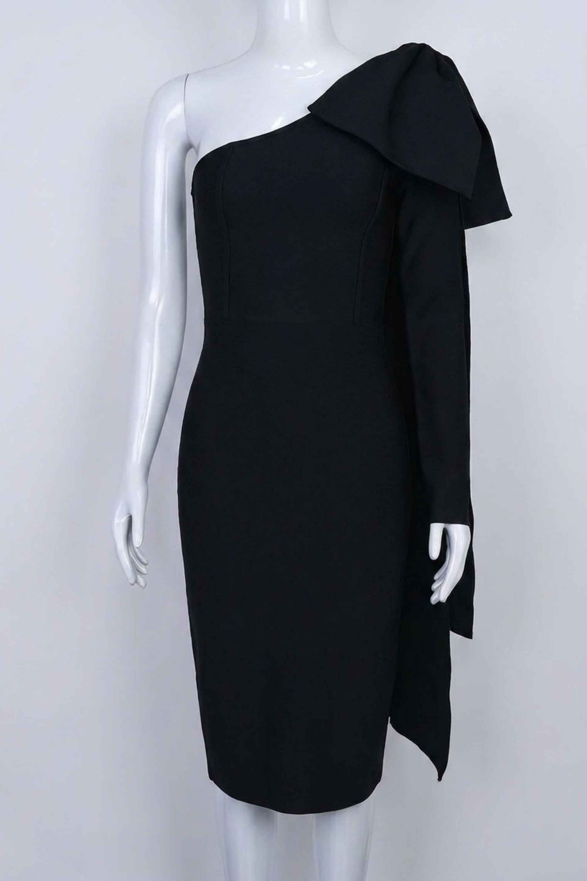 Woman wearing a figure flattering Lela Long Sleeve Bandage Midi Dress - Classic Black BODYCON COLLECTION