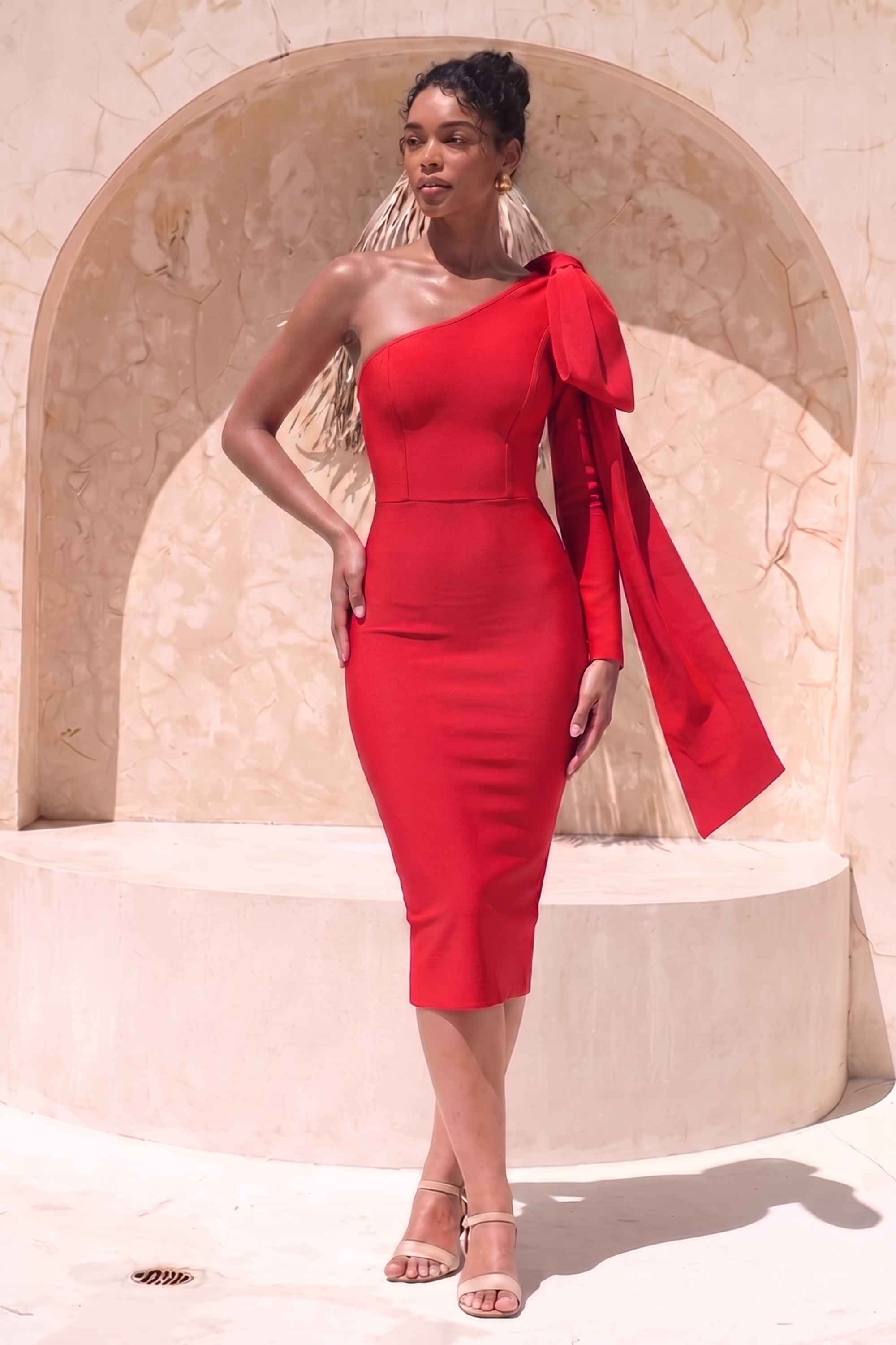 Woman wearing a figure flattering Lela Long Sleeve Bandage Midi Dress - Lipstick Red BODYCON COLLECTION