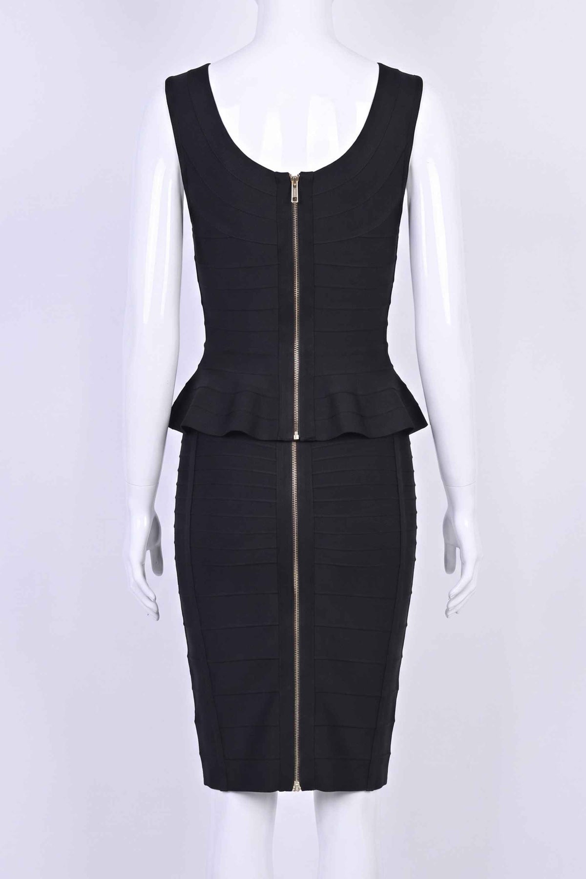 Woman wearing a figure flattering Leni Bandage Top and Knee Length Skirt Set - Classic Black BODYCON COLLECTION