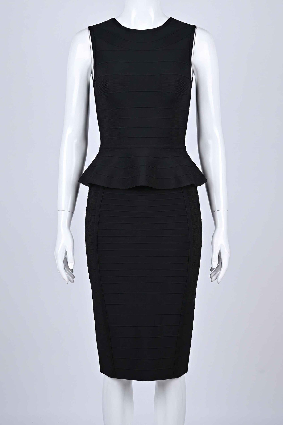 Woman wearing a figure flattering Leni Bandage Top and Knee Length Skirt Set - Classic Black BODYCON COLLECTION