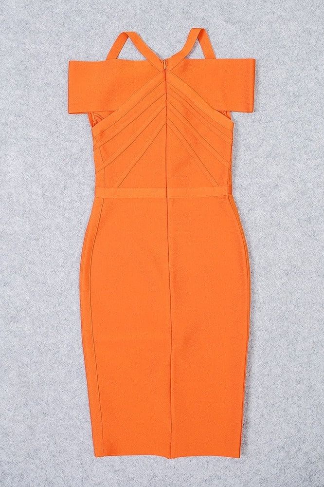 Woman wearing a figure flattering Leo Bandage Midi Dress - Apricot Orange Bodycon Collection