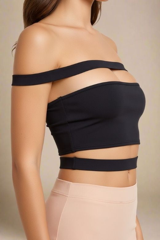 Woman wearing a figure flattering Lexia Bandage Crop Top - Classic Black BODYCON COLLECTION