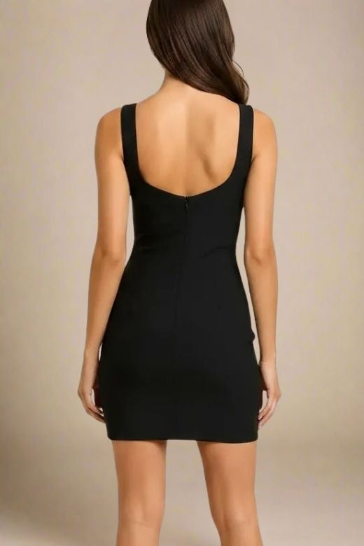 Woman wearing a figure flattering Livia Wrap Bodycon Mini Dress - Classic Black BODYCON COLLECTION Pty Ltd