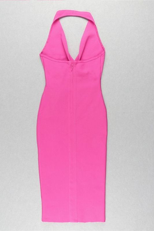 Woman wearing a figure flattering London Bandage Dress - Hot Pink BODYCON COLLECTION