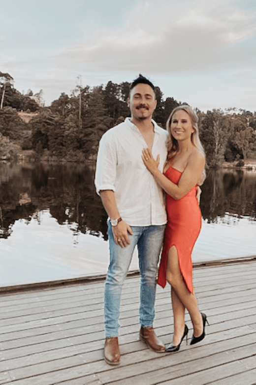 Woman wearing a figure flattering Luna Bodycon Dress - Lipstick Red Bodycon Collection