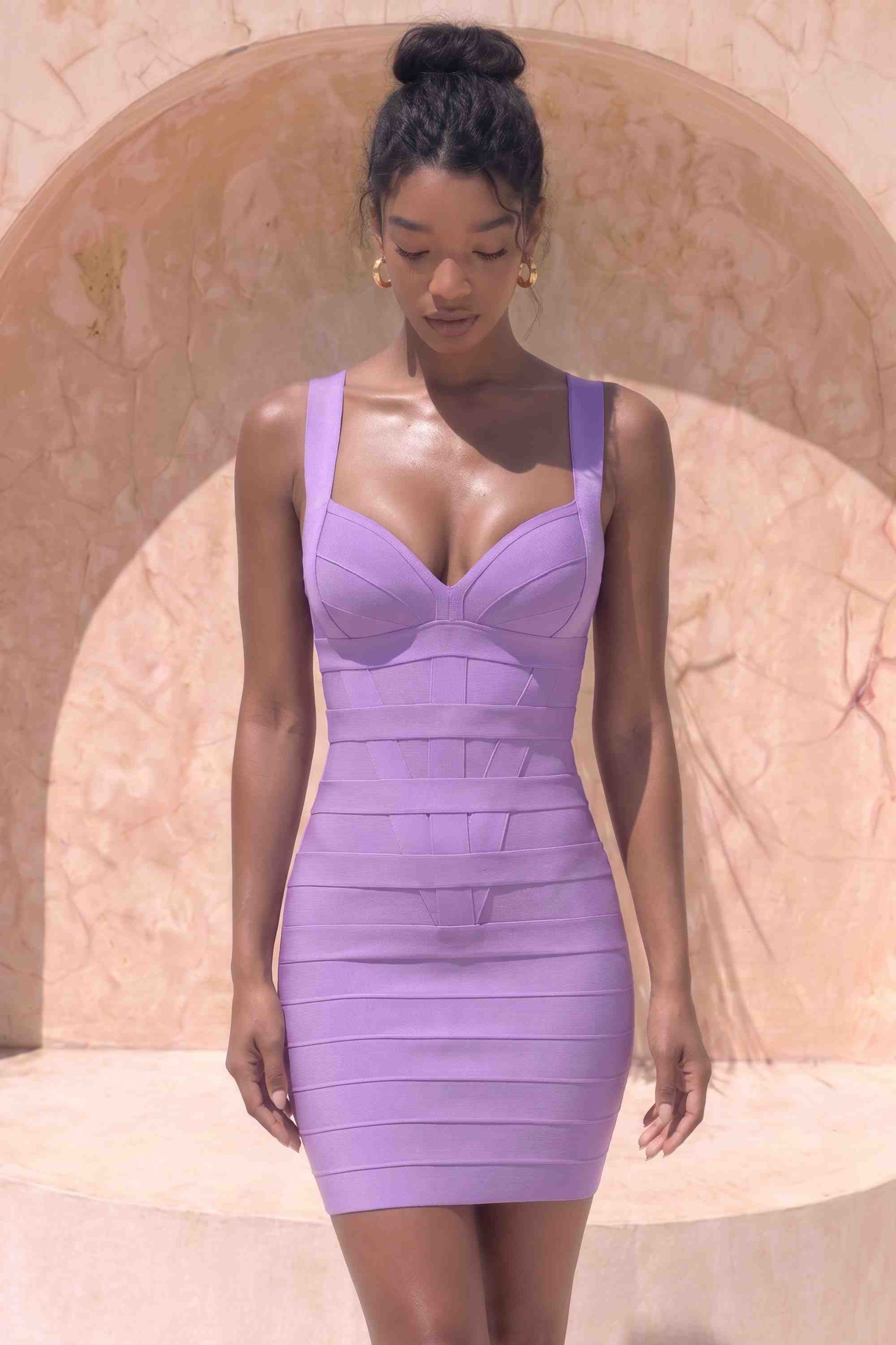 Woman wearing a figure flattering Madison Bandage Mini Dress - Violet Purple BODYCON COLLECTION Pty Ltd
