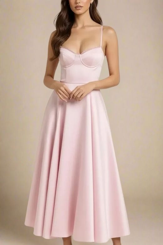 Woman wearing a figure flattering Mavis Bodycon Midi Dress - Dusty Pink BODYCON COLLECTION