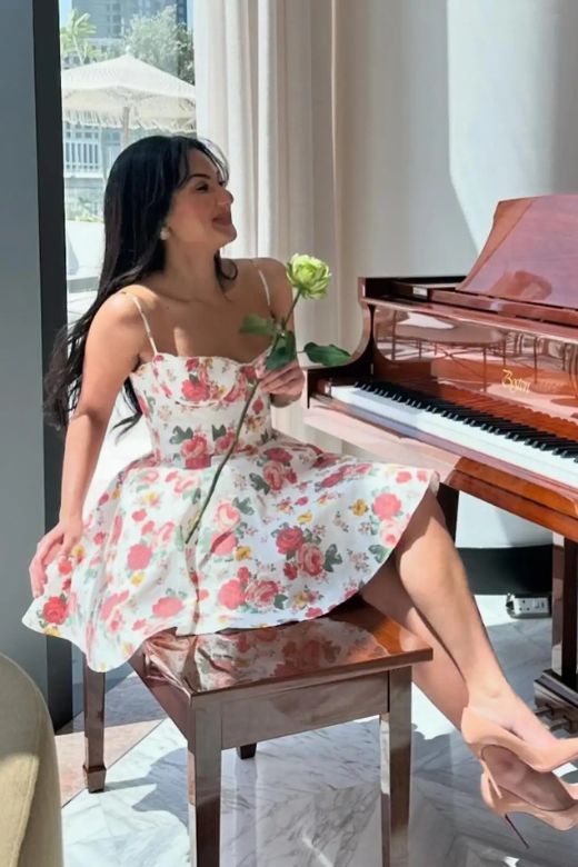 Woman wearing a figure flattering Mavis Bodycon Mini Dress - Baby Blue BODYCON COLLECTION