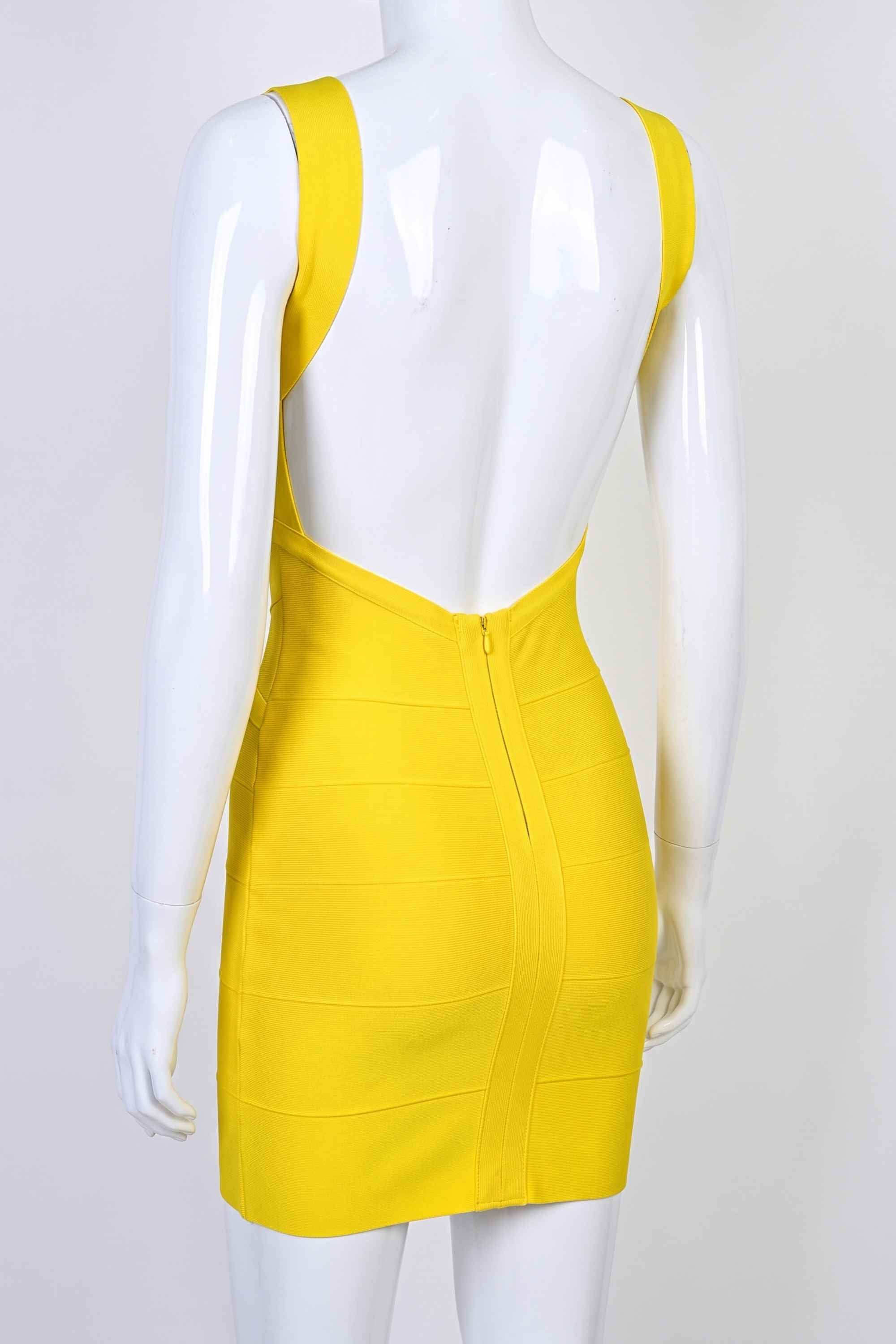 Woman wearing a figure flattering Maya Bandage Mini Dress - Sun Yellow BODYCON COLLECTION
