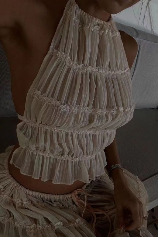 Woman wearing a figure flattering Meryl Wrap Top and Maxi Skirt Set - Cream BODYCON COLLECTION