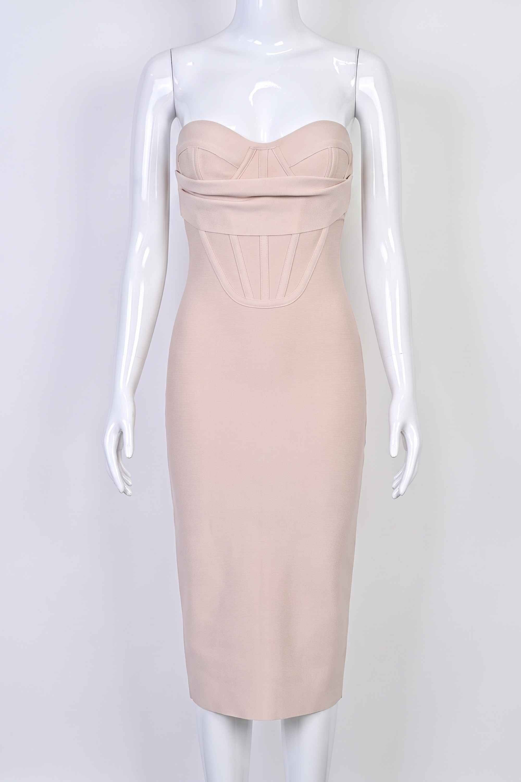 Woman wearing a figure flattering Miles Bodycon Midi Dress - Nude BODYCON COLLECTION