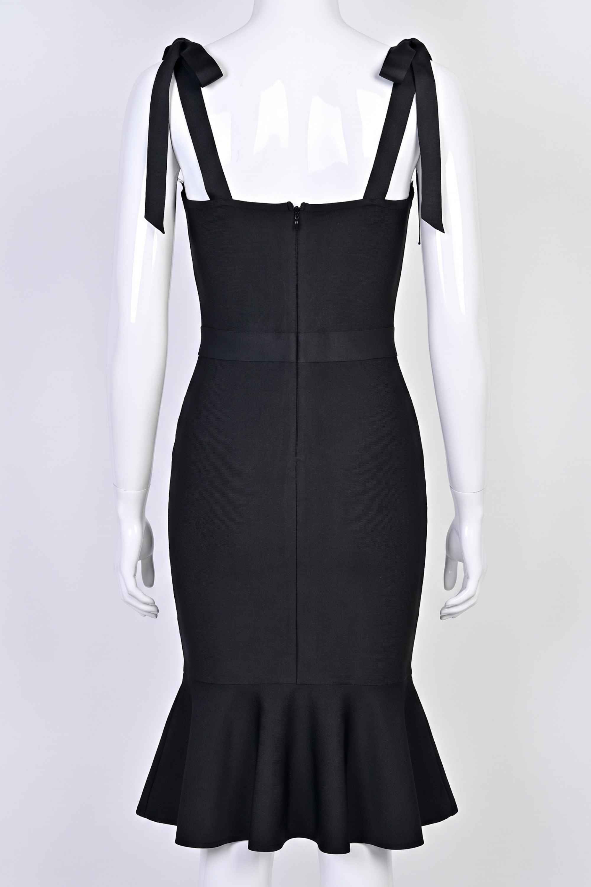 Woman wearing a figure flattering Nora Bandage Midi Dress - Classic Black BODYCON COLLECTION