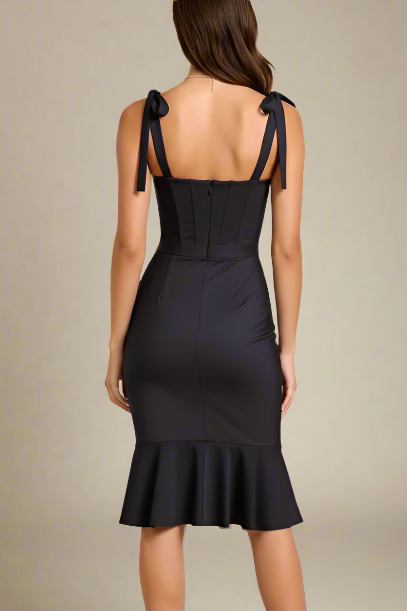 Woman wearing a figure flattering Nora Bandage Midi Dress - Classic Black BODYCON COLLECTION