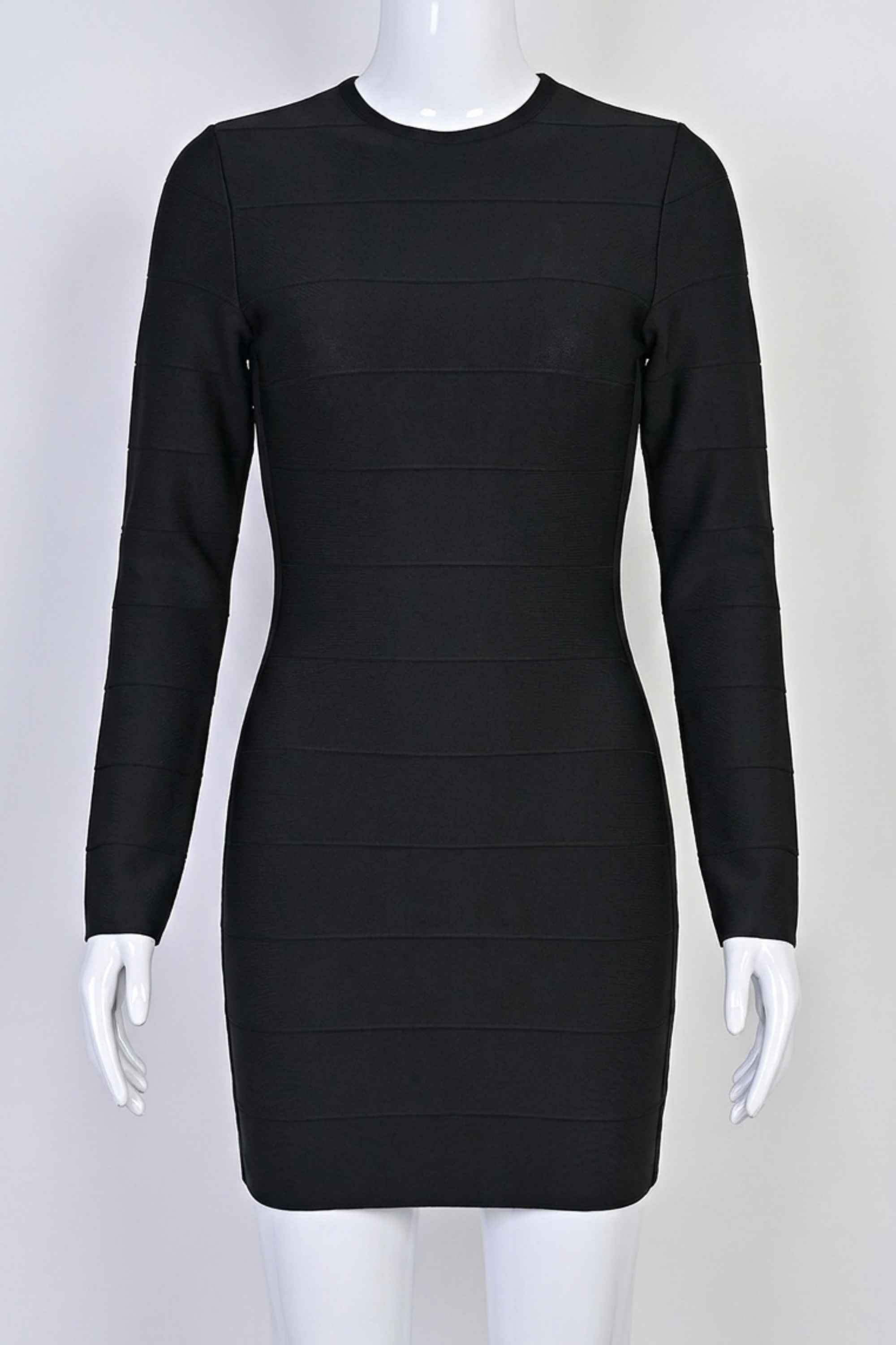 Woman wearing a figure flattering Pamela Long Sleeve Bandage Mini Dress - Classic Black BODYCON COLLECTION