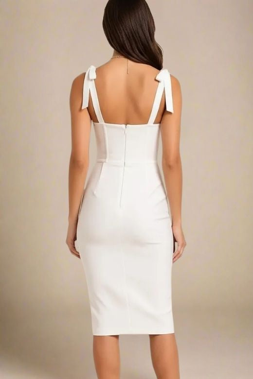 Woman wearing a figure flattering Payton Bandage Dress - Pearl White BODYCON COLLECTION