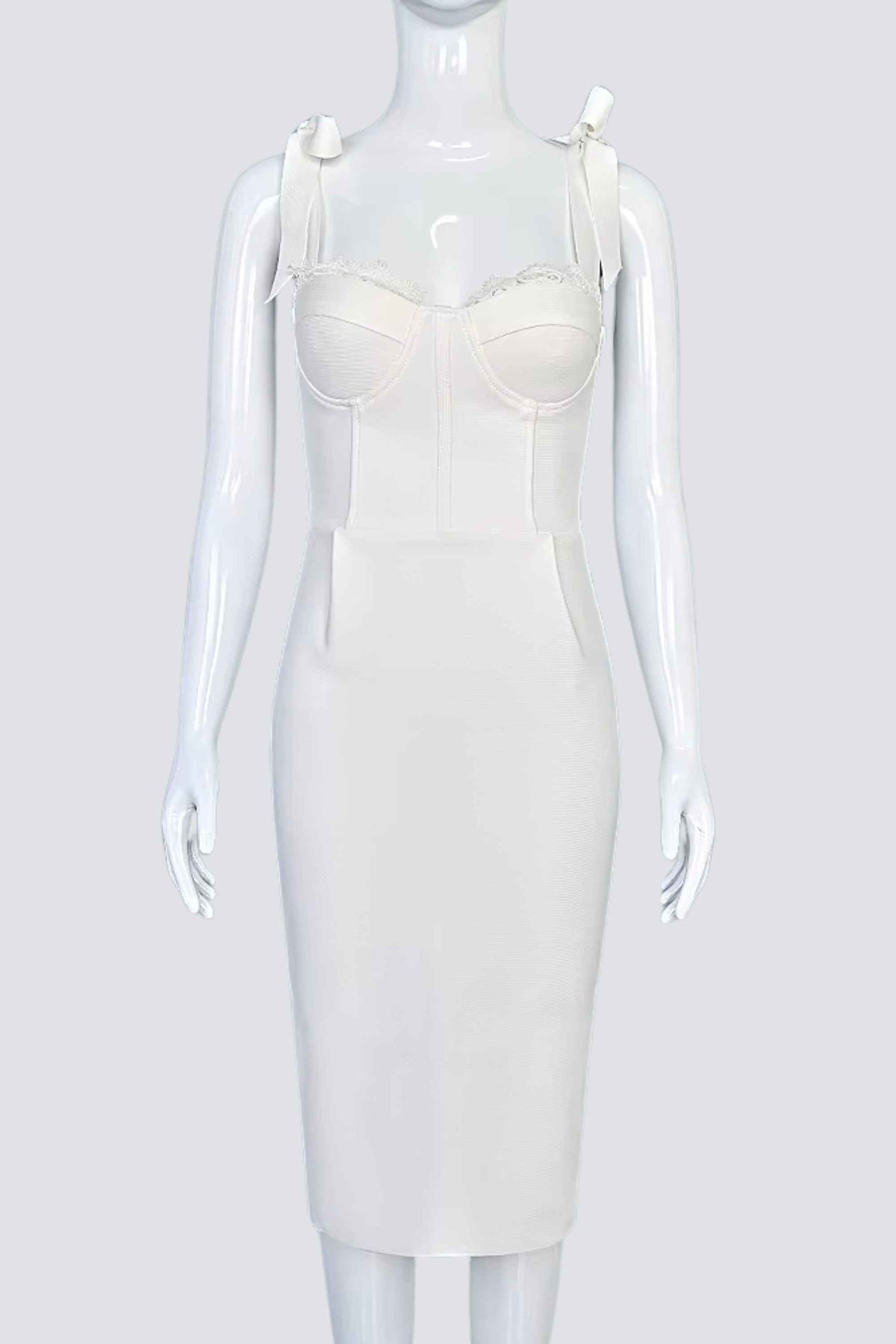 Woman wearing a figure flattering Payton Bandage Dress - Pearl White BODYCON COLLECTION