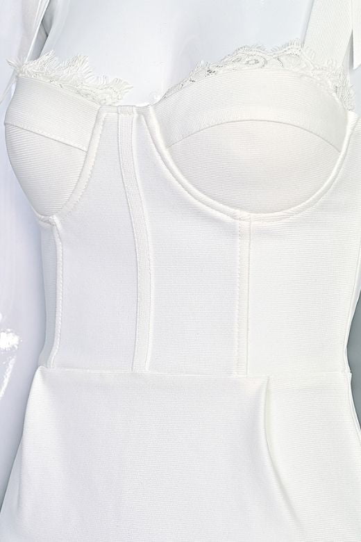 Woman wearing a figure flattering Payton Bandage Dress - White Pearl BODYCON COLLECTION