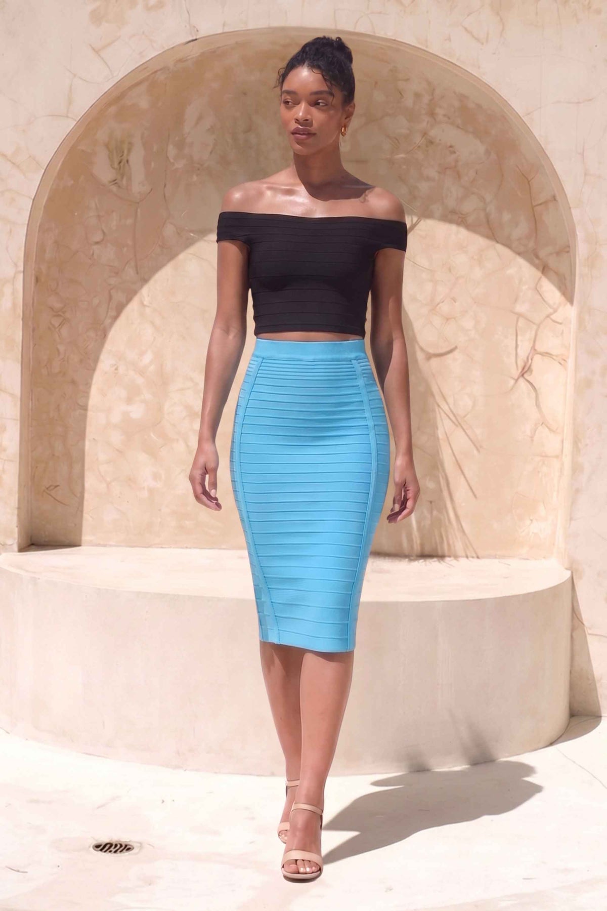 Woman wearing a figure flattering Pencil High Waist Bandage Knee Length Knitted Skirt - Sky Blue BODYCON COLLECTION