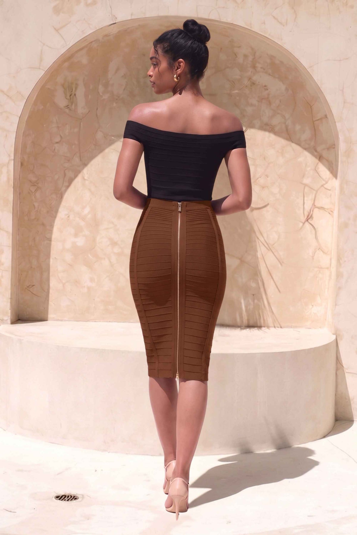Woman wearing a figure flattering Pencil High Waist Bandage Knee Length Knitted Skirt - Tan Brown BODYCON COLLECTION