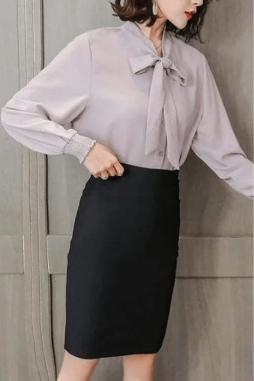 Woman wearing a figure flattering  Pencil High Waist Bandage Knee Length Skirt - Tan Brown BODYCON COLLECTION