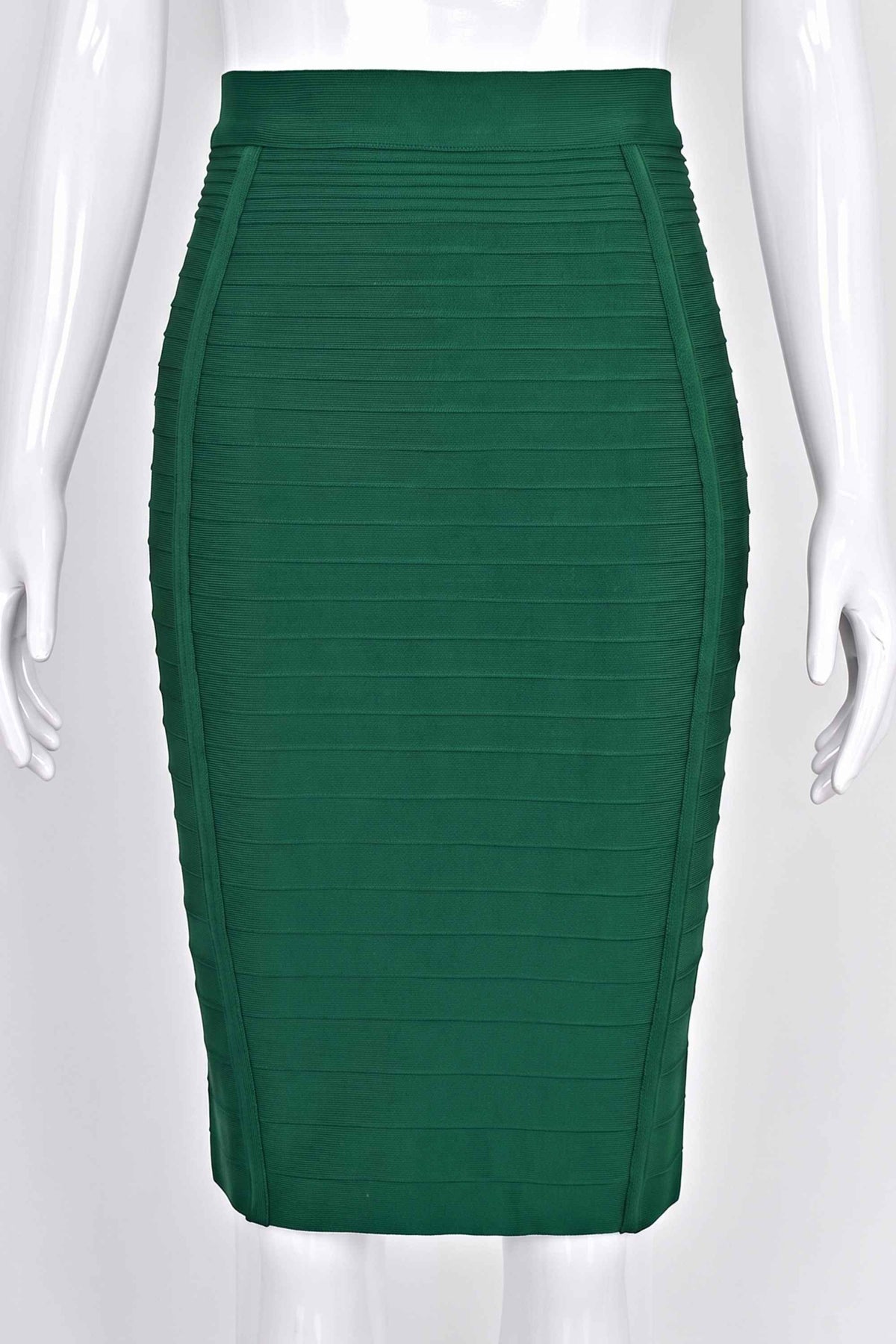 Woman wearing a figure flattering Pencil High Waist Knitted Knee Length Skirt - Emerald Green BODYCON COLLECTION