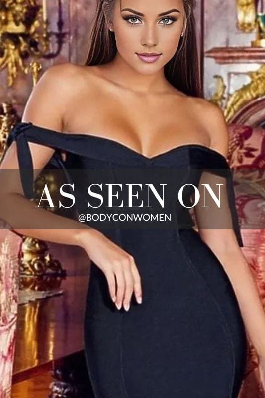Woman wearing a figure flattering  Penelope Bandage Mini Dress - Classic Black BODYCON COLLECTION