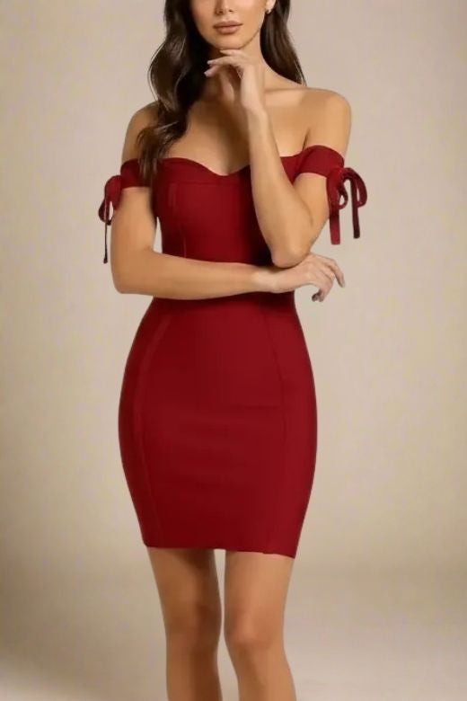 Woman wearing a figure flattering Penelope Bandage Mini Dress - Red Wine BODYCON COLLECTION