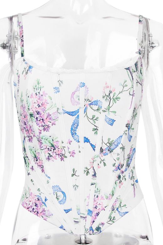 Woman wearing a figure flattering Penny Corset Top - White Floral BODYCON COLLECTION Pty Ltd