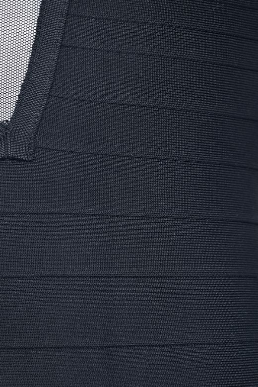 Woman wearing a figure flattering Remi Bandage Mini Dress - Classic Black BODYCON COLLECTION Pty Ltd