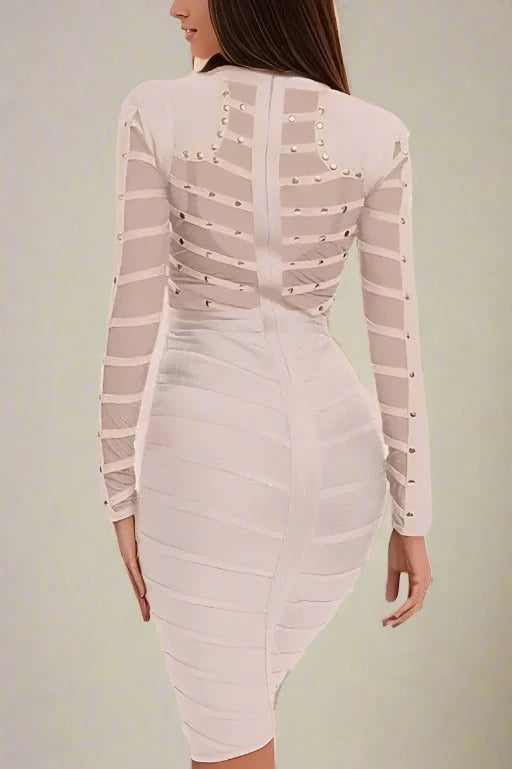 Woman wearing a figure flattering  Rosa Long Sleeve Bodycon Dress - Cream BODYCON COLLECTION