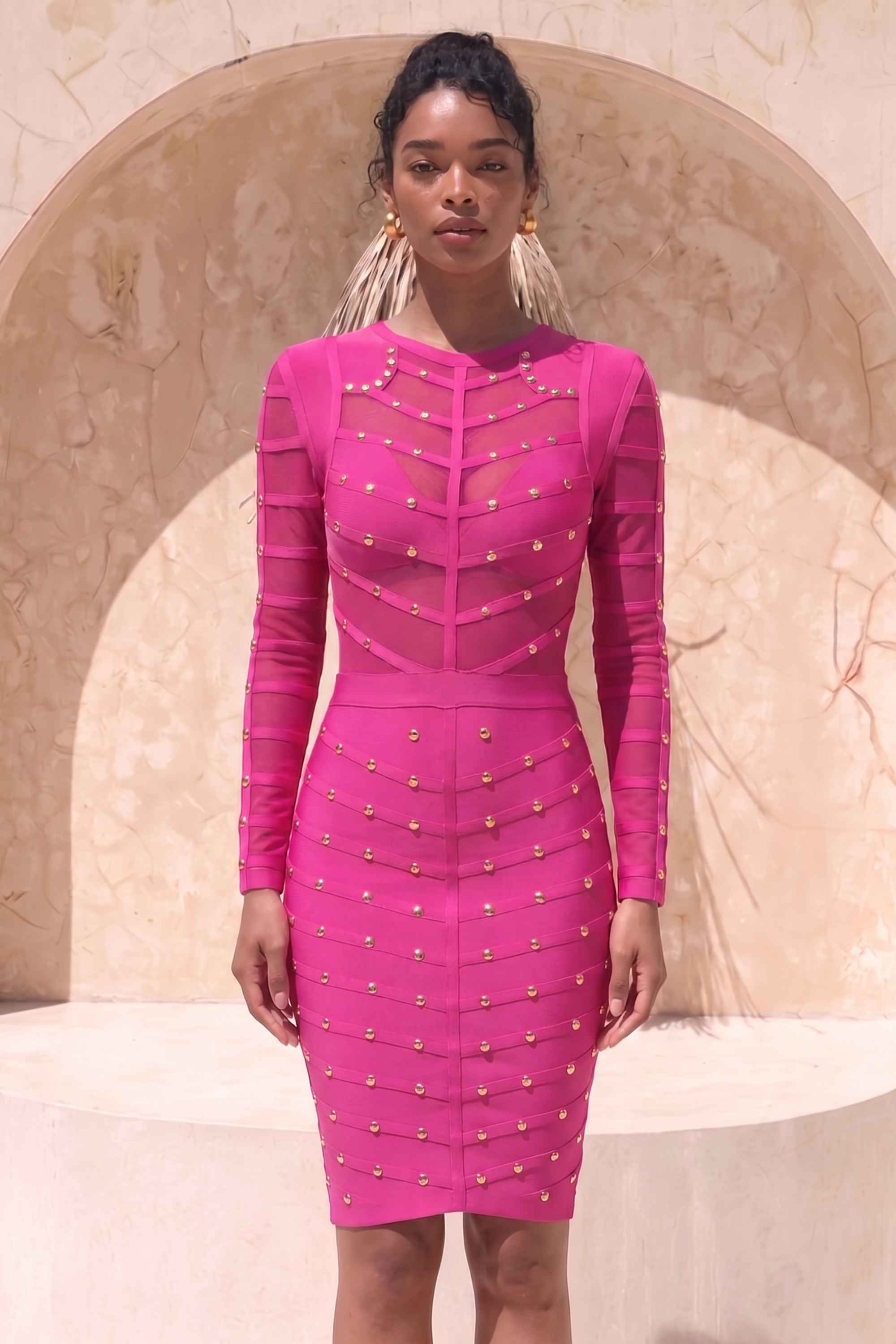 Woman wearing a figure flattering Rosa Long Sleeve Bodycon Dress - Neon Purple BODYCON COLLECTION