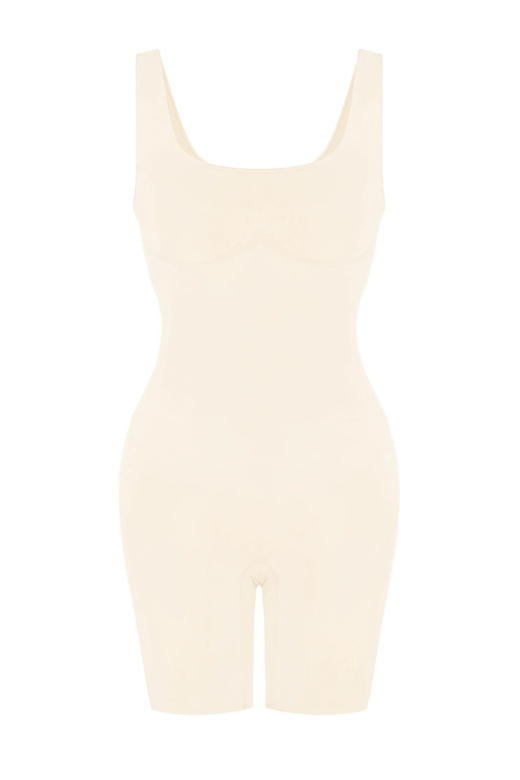 Woman wearing a figure flattering Round Neck One Piece Bodysuit Shapewear - Mid Thigh Bodycon Collection