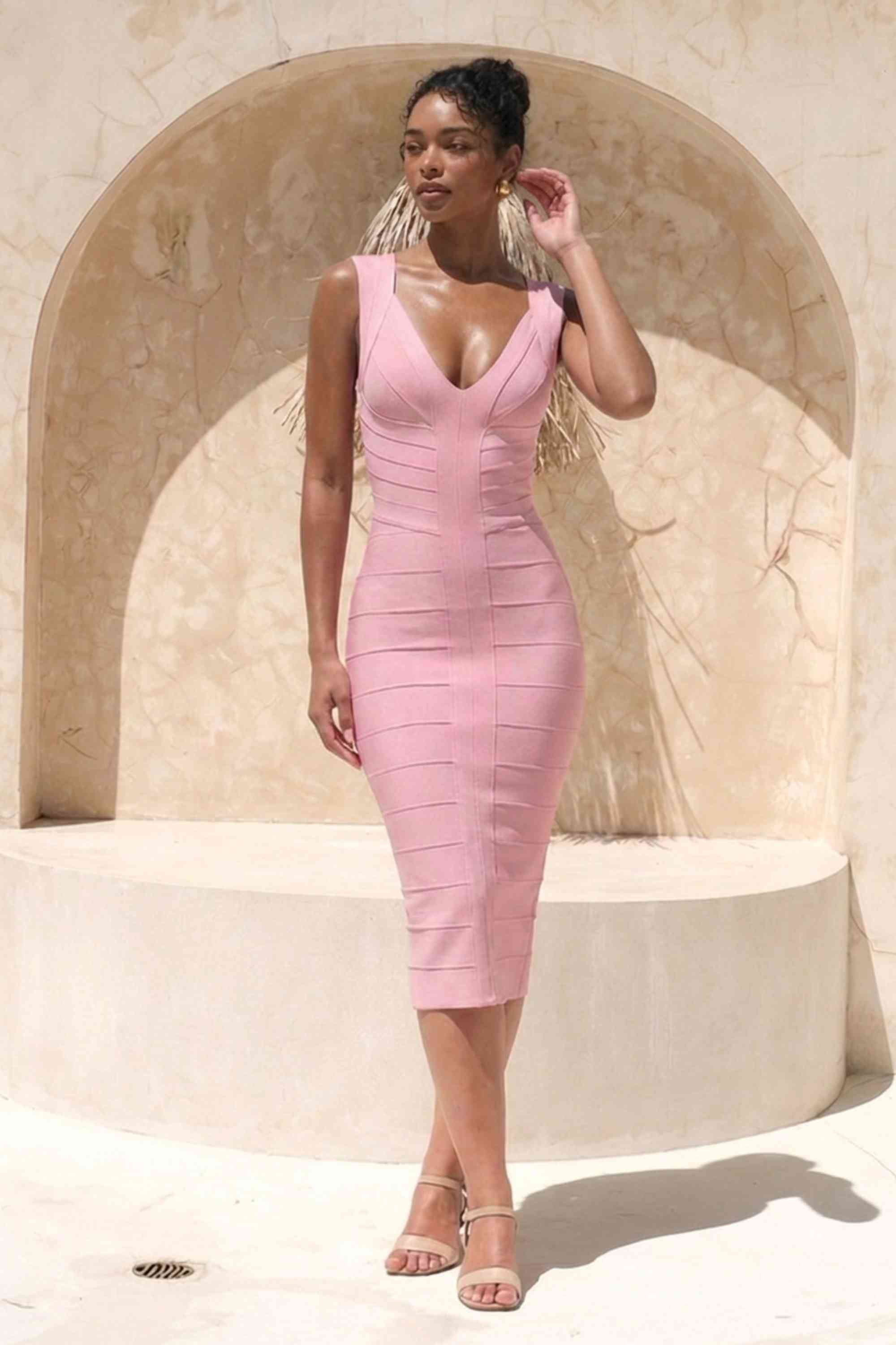 Woman wearing a figure flattering Sabrina Bandage Midi Dress - Dusty Pink BODYCON COLLECTION Pty Ltd