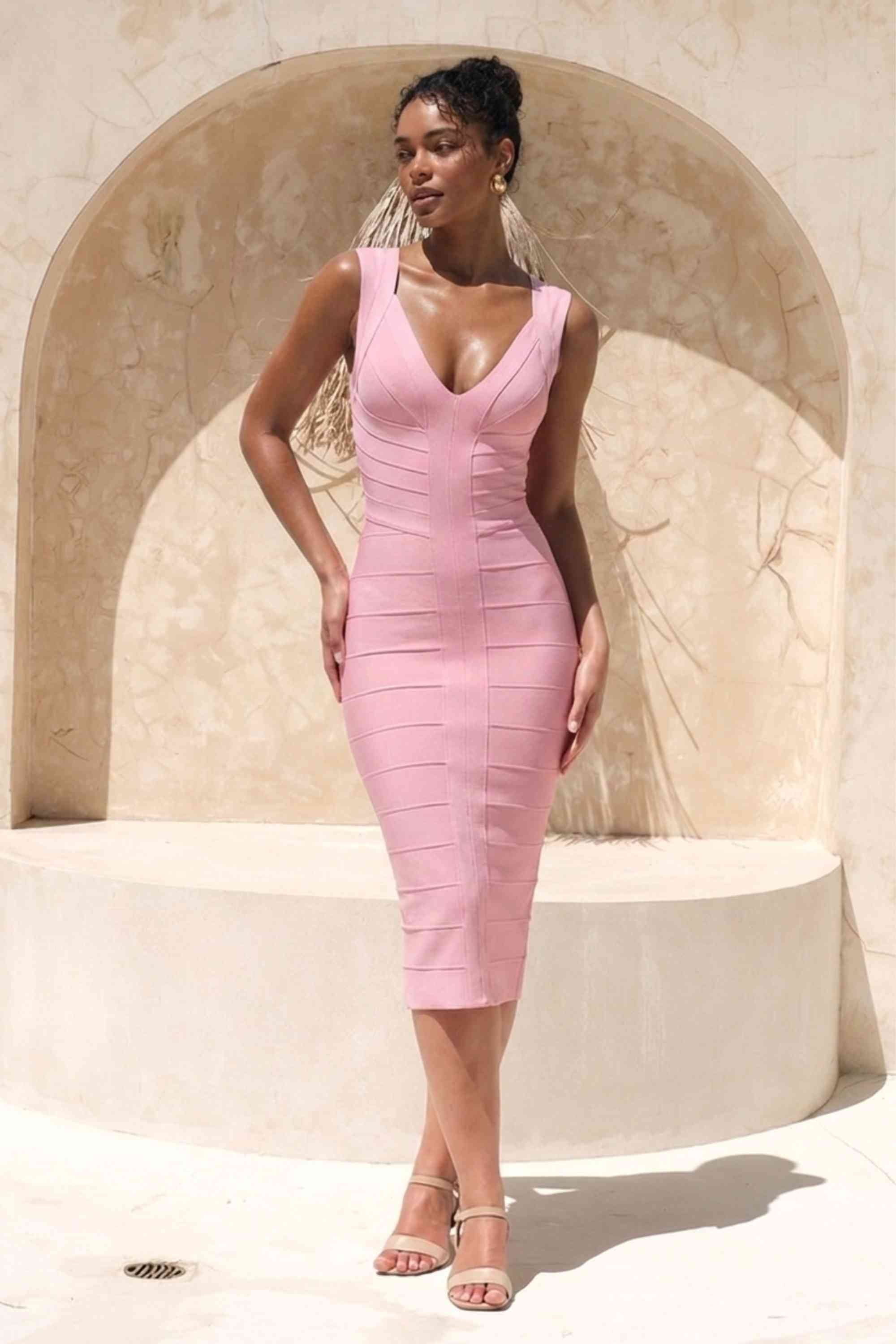 Woman wearing a figure flattering Sabrina Bandage Midi Dress - Dusty Pink BODYCON COLLECTION Pty Ltd