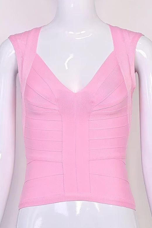 Woman wearing a figure flattering Sabrina Bandage Top - Dusty Pink BODYCON COLLECTION Pty Ltd