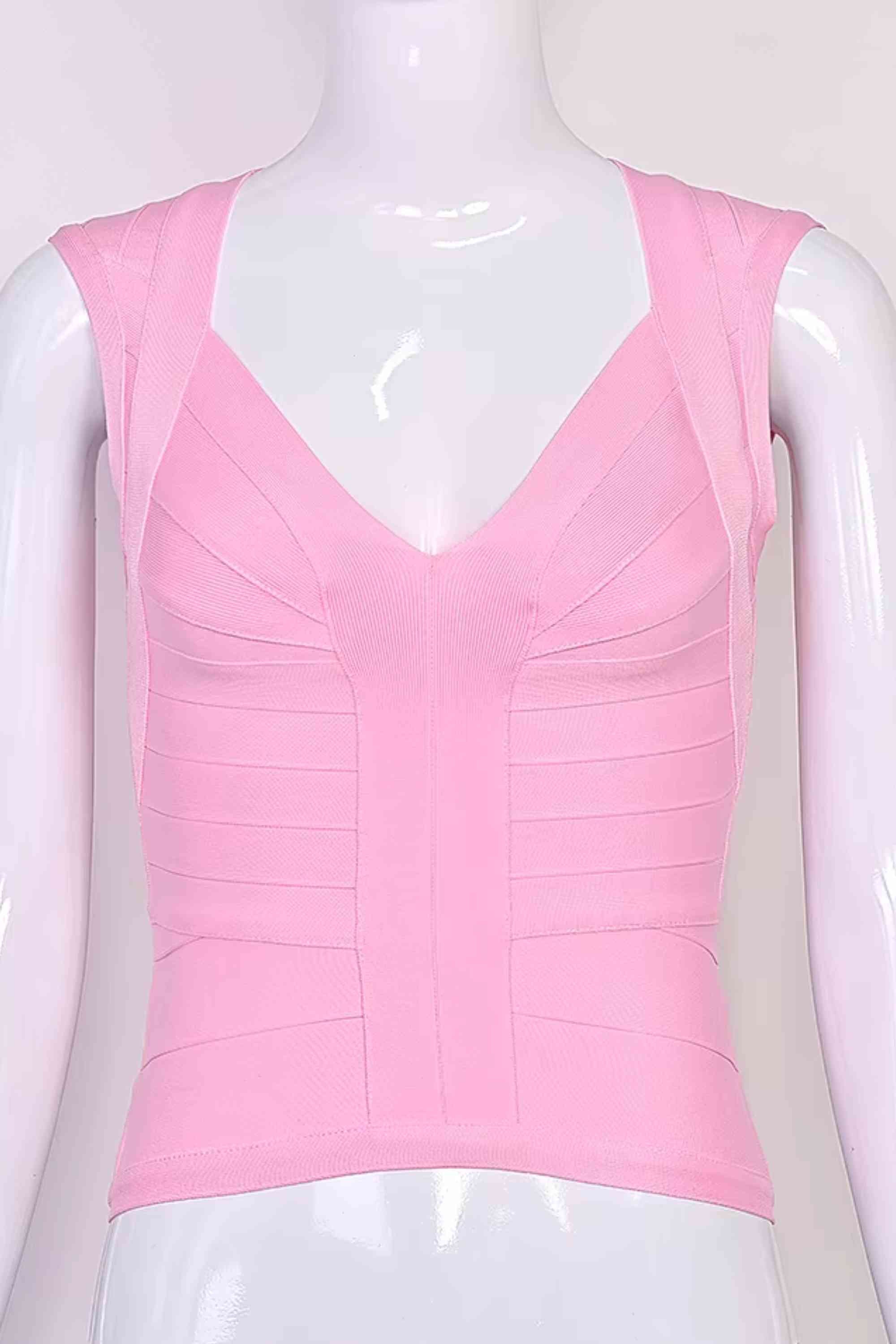 Woman wearing a figure flattering Sabrina Bandage Top - Dusty Pink BODYCON COLLECTION Pty Ltd