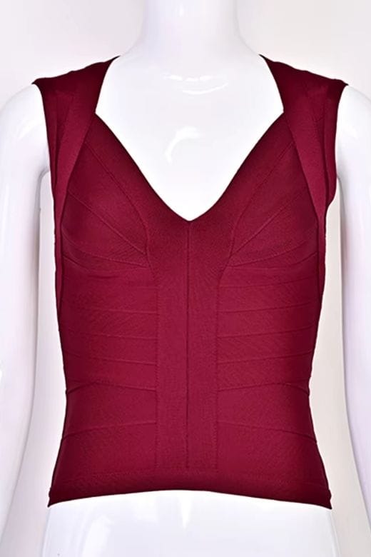 Woman wearing a figure flattering Sabrina Bandage Top - Red Wine BODYCON COLLECTION Pty Ltd