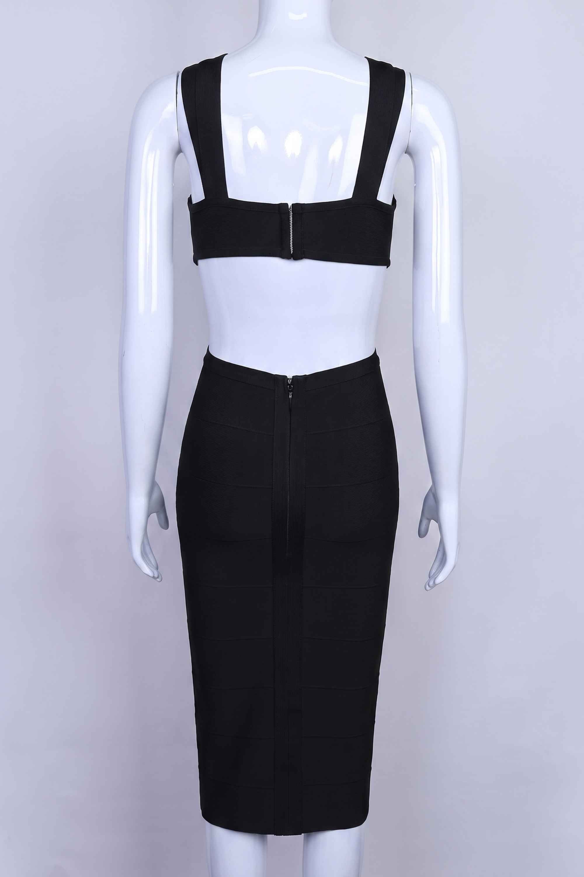 Woman wearing a figure flattering Sasha Bandage Midi Dress - Classic Black BODYCON COLLECTION