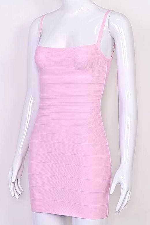 Woman wearing a figure flattering Scarlett Bandage Mini Dress - Dusty Pink BODYCON COLLECTION Pty Ltd
