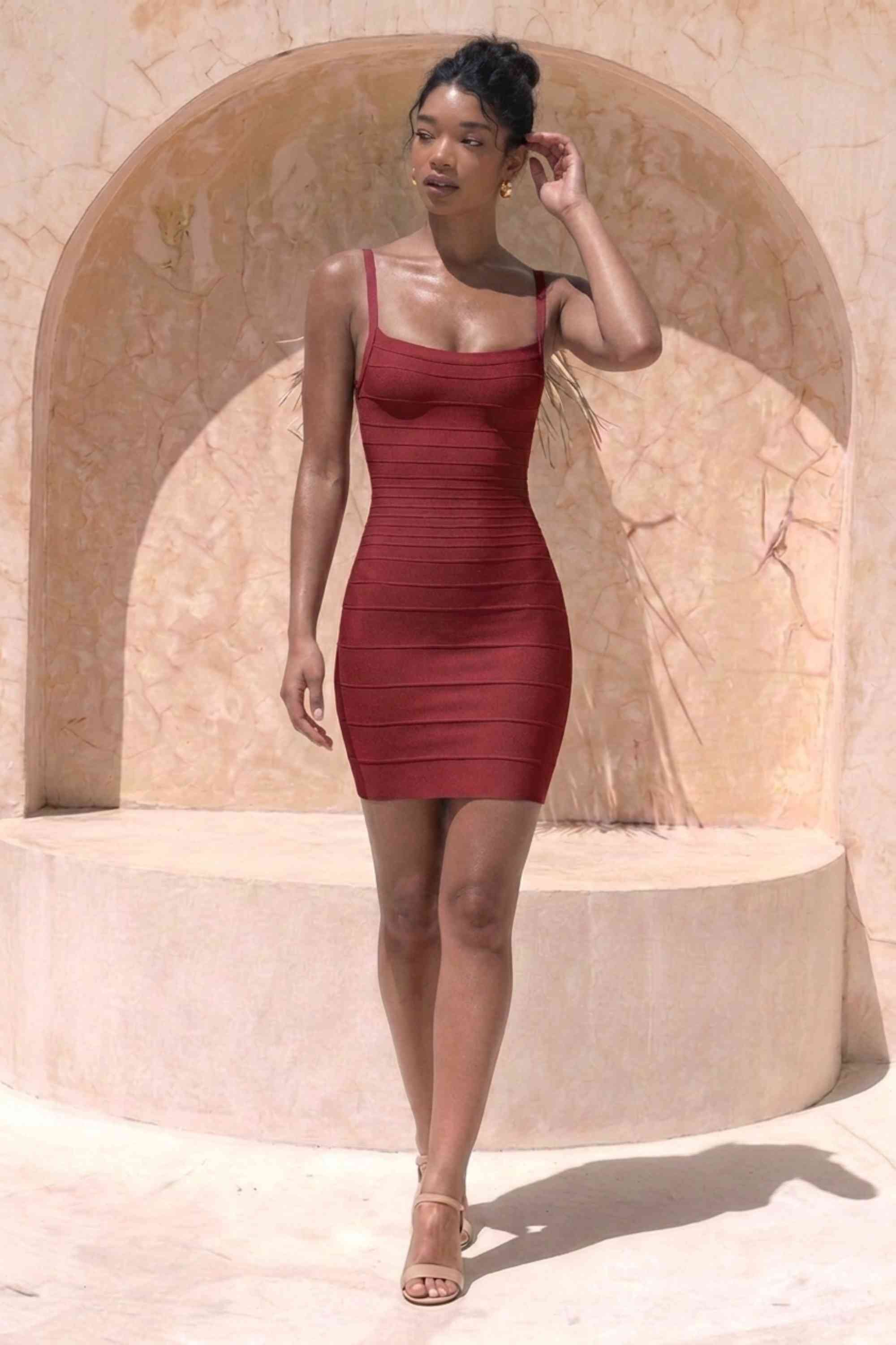 Woman wearing a figure flattering Scarlett Bandage Mini Dress - Red Wine BODYCON COLLECTION Pty Ltd