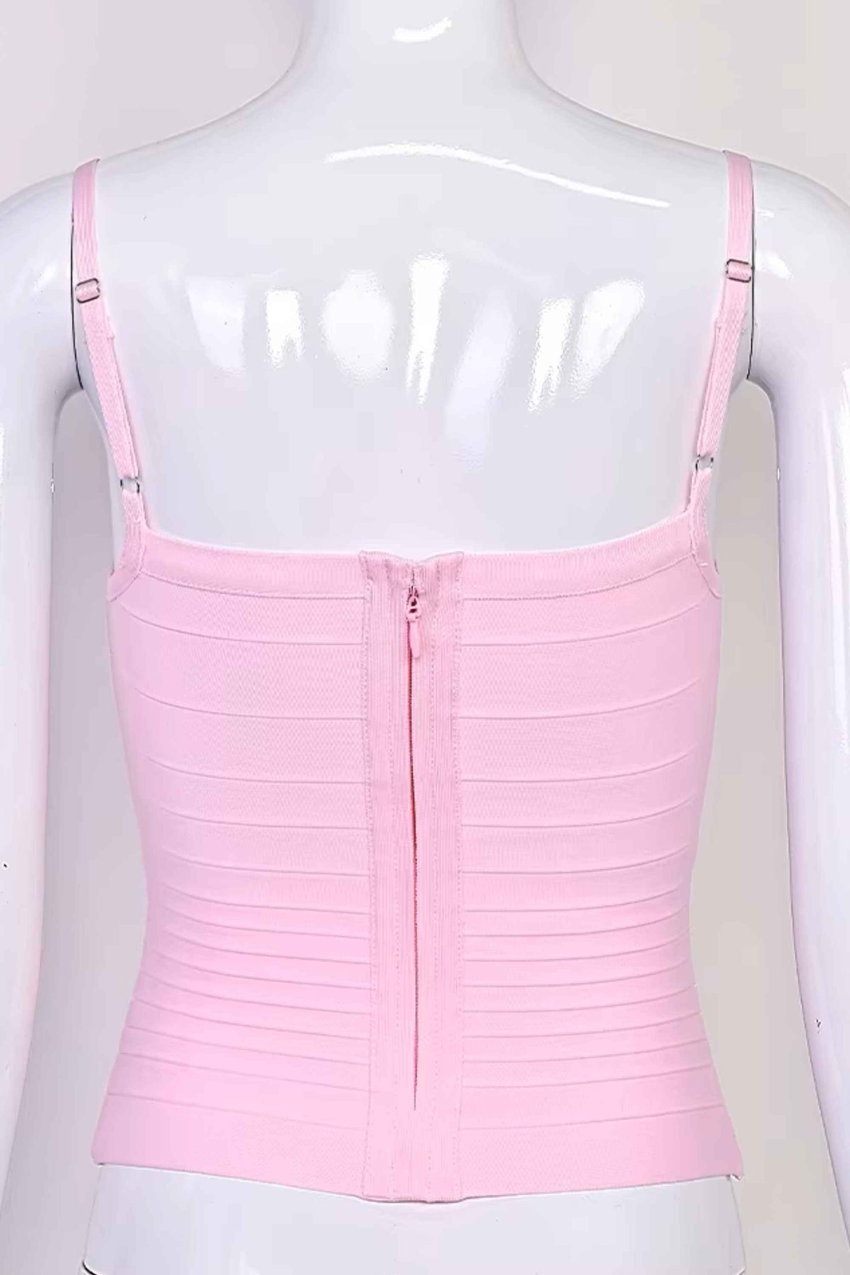 Woman wearing a figure flattering Scarlett Bandage Tank Top - Dusty Pink BODYCON COLLECTION Pty Ltd