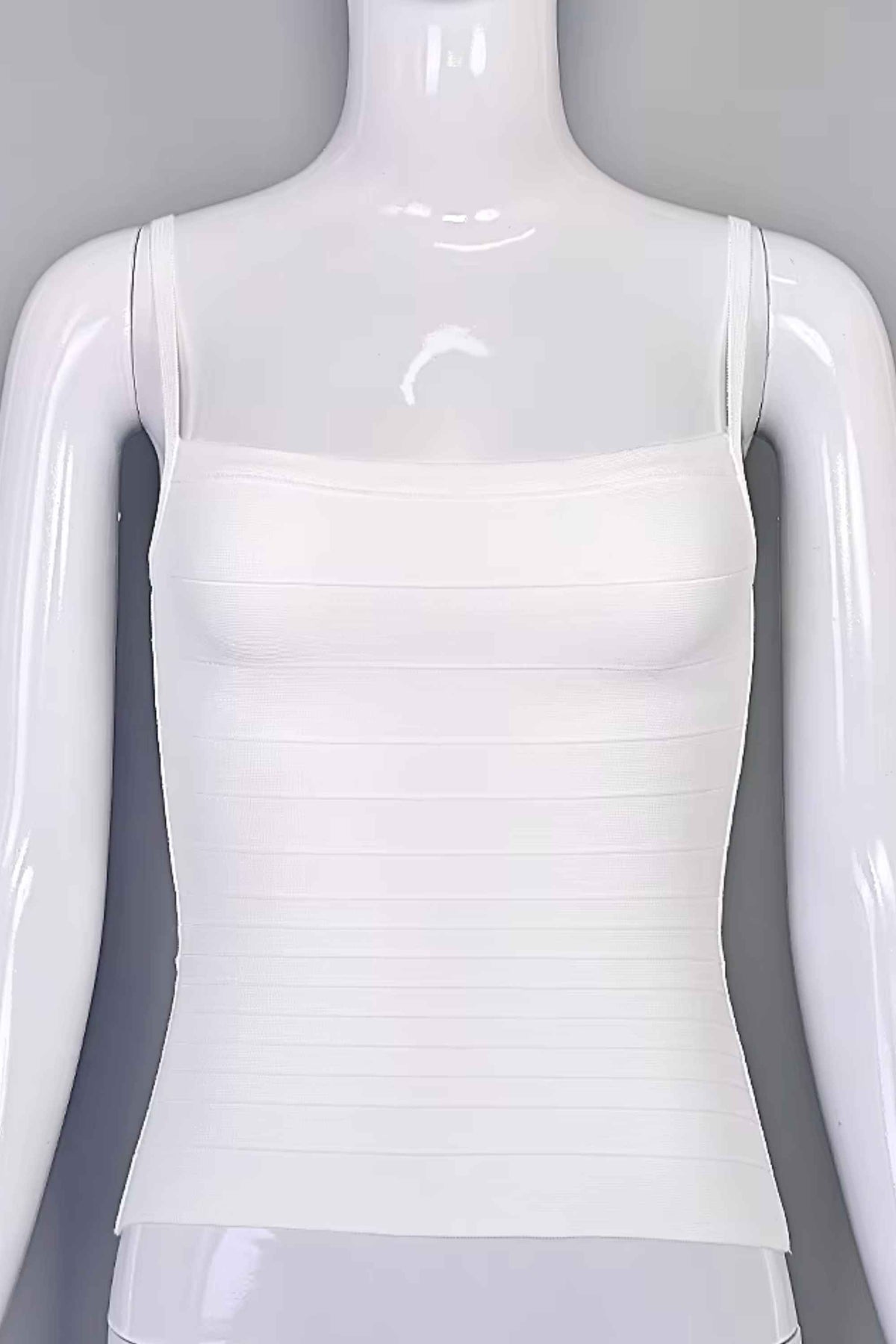 Woman wearing a figure flattering Scarlett Bandage Tank Top - White Pearl BODYCON COLLECTION Pty Ltd